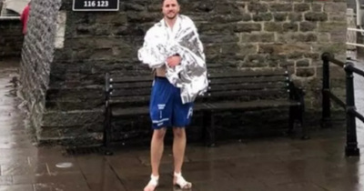 Police officer walks 17 miles barefoot in just his shorts for charity