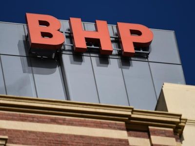 BHP H1 profit soars, lifts dividend