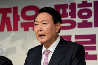 S.Korea candidates kick off presidential race dominated by scandal, third-party challenge