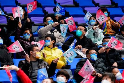 China crafts a carefully curated slate of Olympic spectators