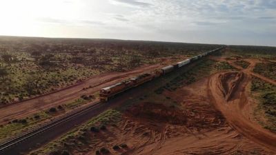 Vital rail link between SA, the NT and WA reopens 25 days after floods