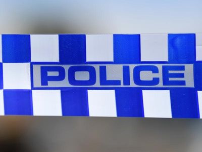 Man dies as van collides with police car