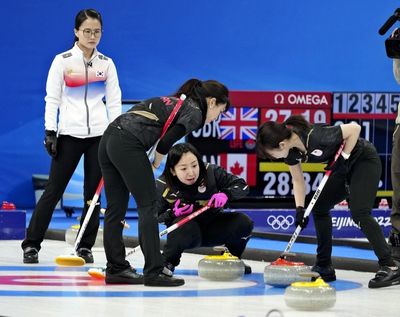 Japan's curlers humbled by nemesis South Korea