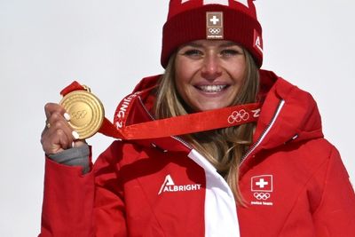 Suter confirms Swiss dominance with Olympic downhill gold