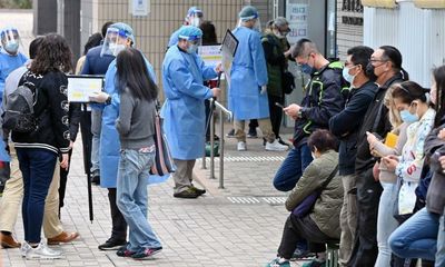 Hong Kong turns public housing into Covid quarantine facilities as it battles Omicron surge