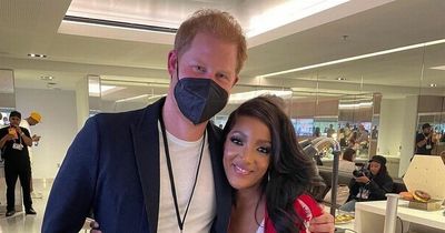 Super Bowl singer insists Prince Harry was 'just lovely' as the pair share sweet hug