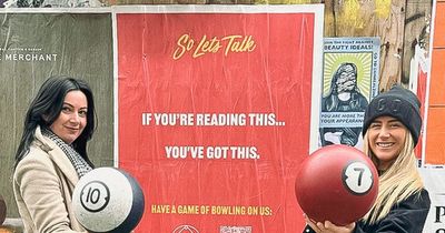 Giant red posters appear in Liverpool with 'hidden message' for people to track down