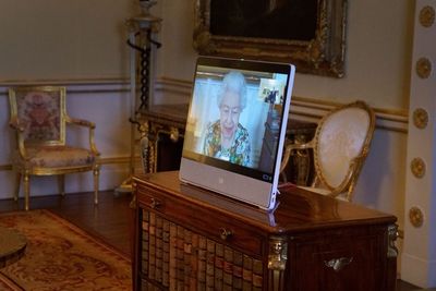 Queen pictured at work holding virtual audiences after Covid scare