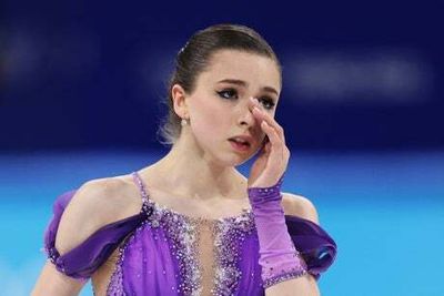 Kamila Valieva in position for more Winter Olympic gold after tearful display in figure skating short programme