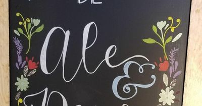 Bride red-faced after showing off wedding sign - as others point out rude flaw