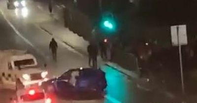 Falls Road 'tactical stop' by PSNI after car drives 'erratically' on both sides of road