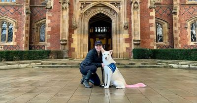 Queen's student and assistance dog standing for office in drive to allow service animal in halls of residence