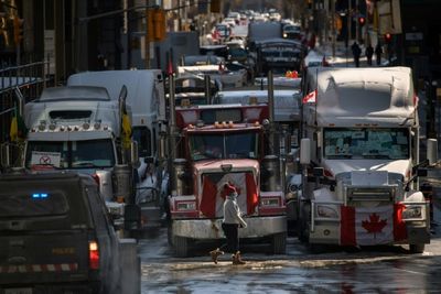 'Hold the line': Canada truckers dig in despite new police powers