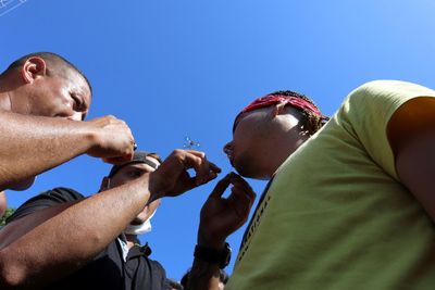 Migrants sew their mouths shut in quest for Mexico passage to U.S. border