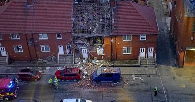 Two rushed to hospital after explosion destroys house