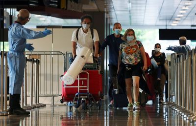 Singapore resumes border reopening after pause due to Omicron outbreak