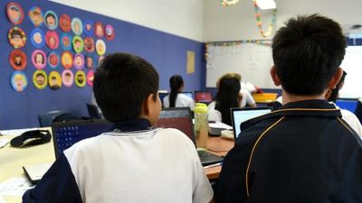 More than 20,000 NSW students caught COVID in first two weeks of school