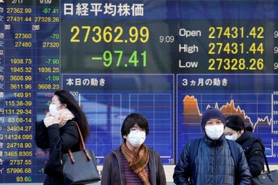 Asian stocks mixed after Fed gives no details of rate hikes
