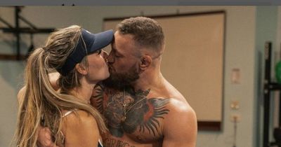 Conor McGregor and fiancee Dee Devlin cosy up during romantic tropical holiday