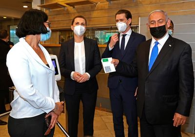 Israel to scrap COVID passport system as omicron wanes