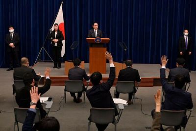 Japan eases virus border rules for workers, students from March 1