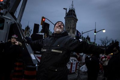 Truckers brace for a police crackdown in besieged Ottawa