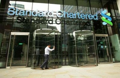 Standard Chartered hands out £1 billion banker bonus pot