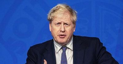 Boris Johnson accuses Russia of 'false flag' operation in Ukraine as images of shell-damaged school appear