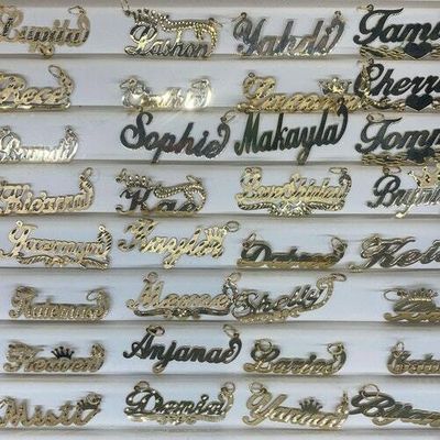 Forget Carrie Bradshaw, nameplate jewelry is more than 'ghetto gold'