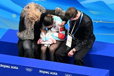 Broken Valieva falls out of medal places as team-mate wins skating gold