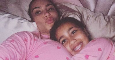 Kim Kardashian looks happier than ever cuddling daughter North amid Kanye drama