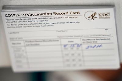 Reservist, nurse charged with running fake vaccine card scam