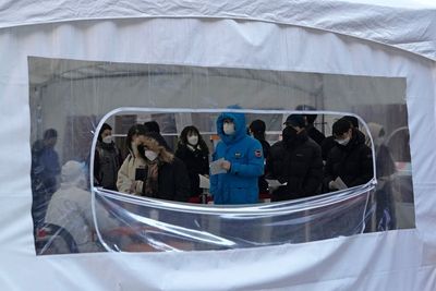 S. Korea keeps crowd limits as omicron causes 25-fold spike