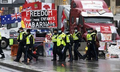 Protesters defy police presence in Ottawa after officers warn of crackdown