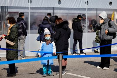 S.Korea daily COVID-19 cases top 100,000, curfew eased ahead of election