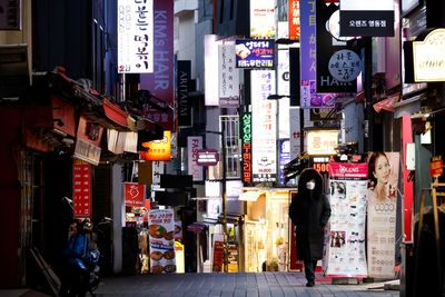 South Korea extends business curfew as COVID-19 cases top 100,000
