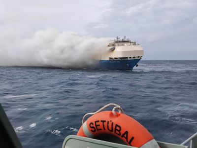 Ship carrying Porsches and Bentleys ablaze near Azores, towing boats en route