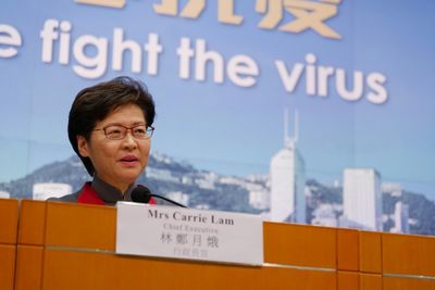 Hong Kong postpones new leader selection over virus outbreak