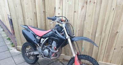 Teenager held after stolen motorbike seized by police