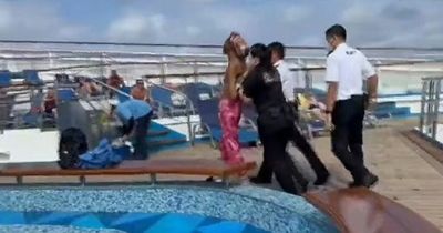 Woman grapples with cruise ship security before 'jumping' overboard and vanishing