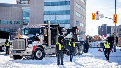 Canadian police arrest over 100 people in trucker protests