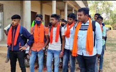 Boys come to college near Khanapur wearing saffron shawls