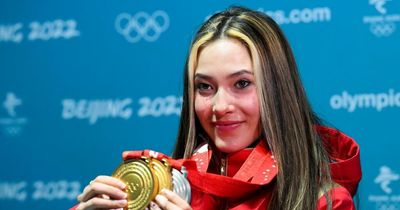 China's golden 'snow princess' Eileen Gu reacts after making Winter Olympics history