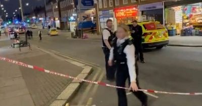 Man in his 20s found stabbed to death in street as police launch investigation