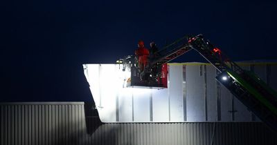 Firefighters rush to Stockport store as signs ripped off during Storm Eustice