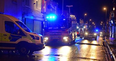 Road closed as fire crews tackle house blaze