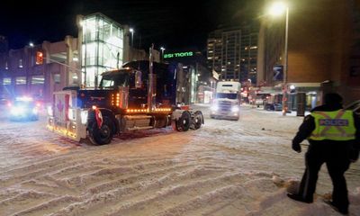 Canadian police arrest at least 100 protesters in bid to break up Ottawa truck blockade