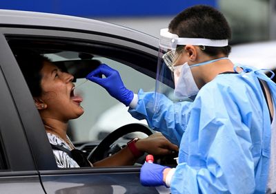 Australia reports 43 COVID deaths before expanded border reopening