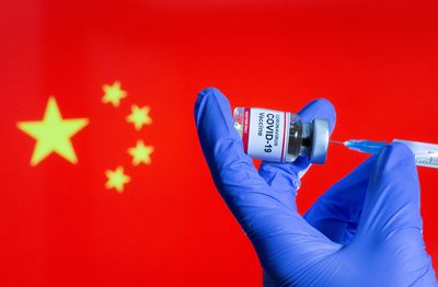 China allows COVID boosters of different technologies than primary shots