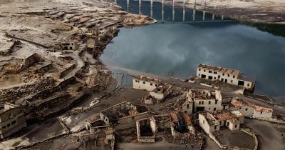 Lost 'ghost village' rises from lake during drought after being submerged 30 years ago